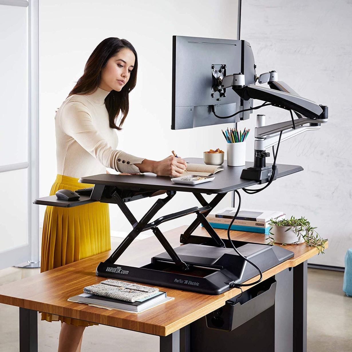 How Do Standing Desks and Adjustable Desks Improve Posture and Reduce Health Risks?